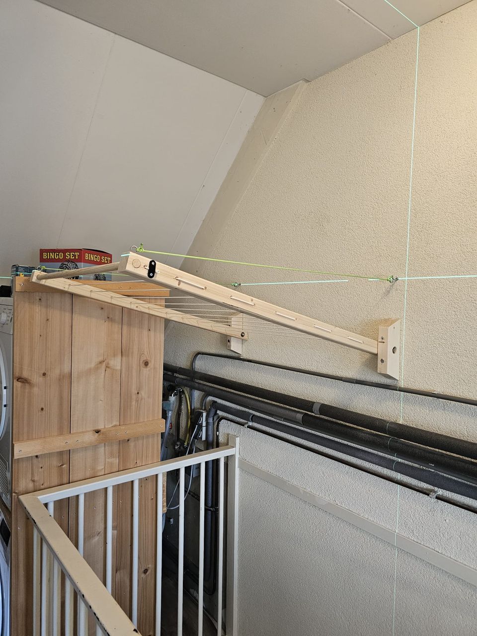 Droogrek op maat aan de muur op zolder